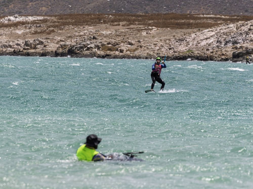 A foil rider crossing the lagoon at Langebaan