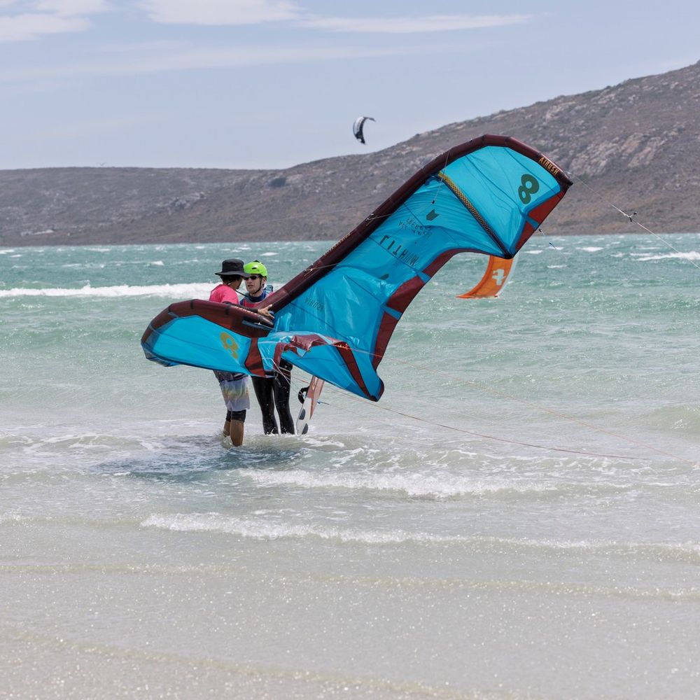A rider lifting a wing to get going on the Langebaan lagoon